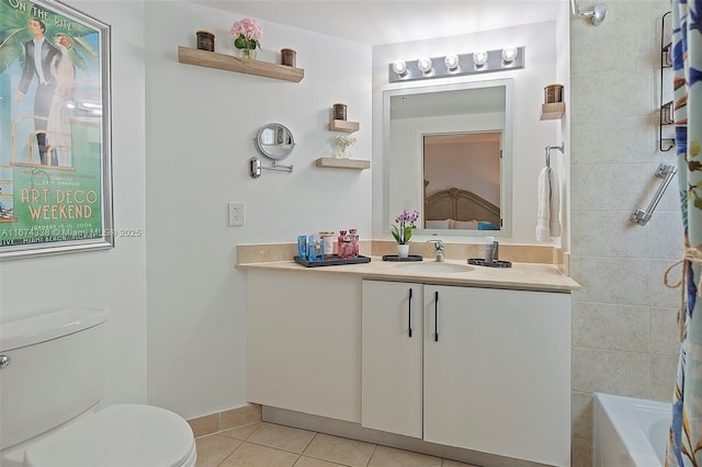 9066 SW 73rd Ct Unit 1205, Miami, FL 33156 - full bath featuring tile patterned flooring, toilet, vanity, and baseboards