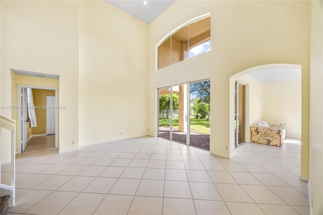 interior space with a towering ceiling