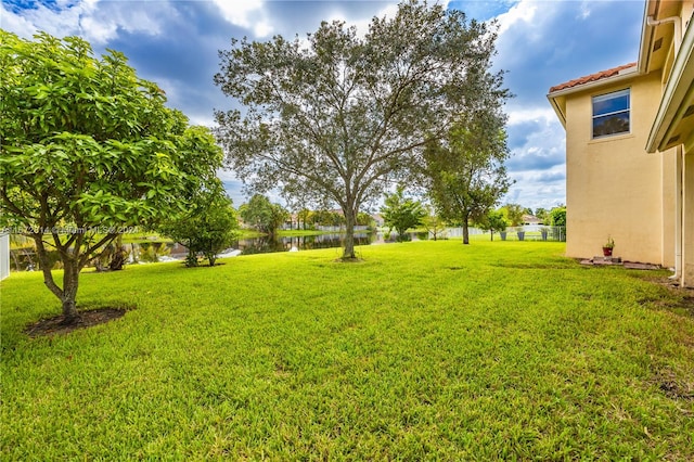 view of yard with a water view