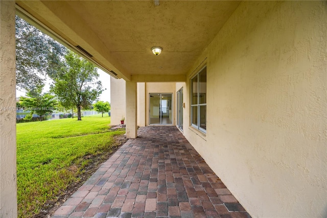 view of patio / terrace featuring a water view