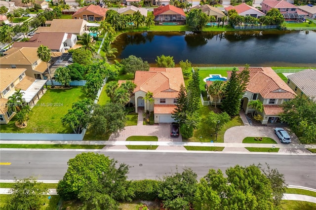 drone / aerial view featuring a water view