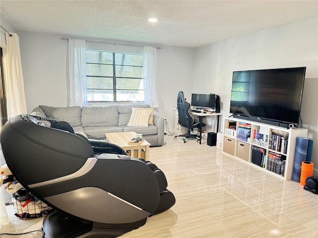 living room with a textured ceiling