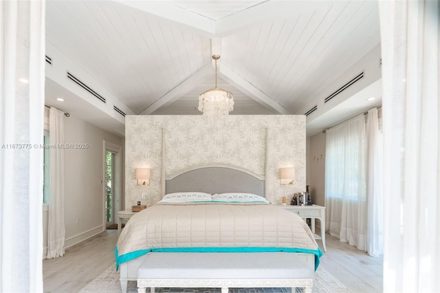 bedroom featuring wooden ceiling, light wood-type flooring, and an inviting chandelier