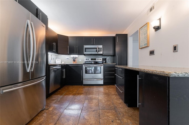 18071 Biscayne Blvd Unit 303, Aventura, FL 33160 - kitchen featuring backsplash, stainless steel appliances, visible vents, and dark cabinetry