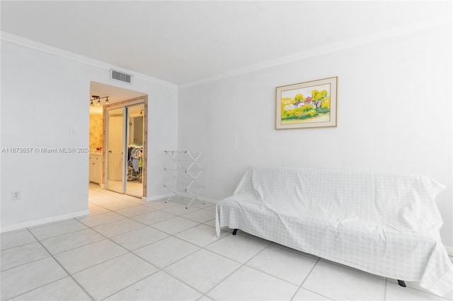 tiled bedroom with ornamental molding