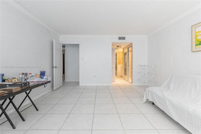 18071 Biscayne Blvd Unit 303, Aventura, FL 33160 - bedroom featuring light tile patterned flooring, baseboards, visible vents, and ornamental molding