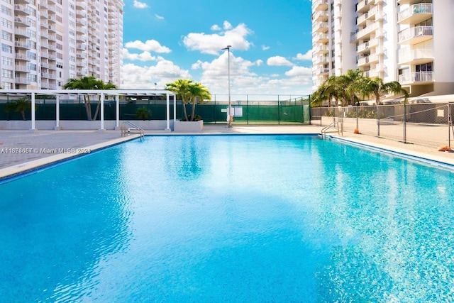 18071 Biscayne Blvd Unit 303, Aventura, FL 33160 - pool featuring fence