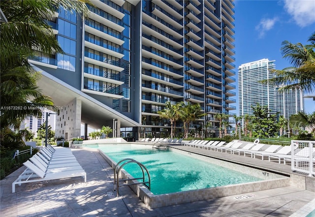 view of swimming pool featuring a patio