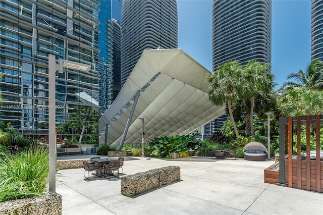 view of home's community with a patio