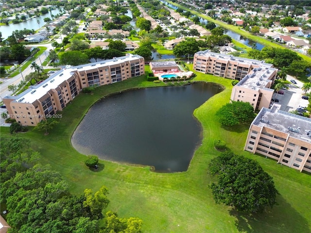 bird's eye view with a water view