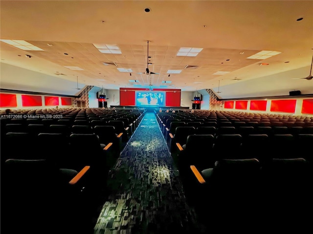 cinema featuring carpet flooring