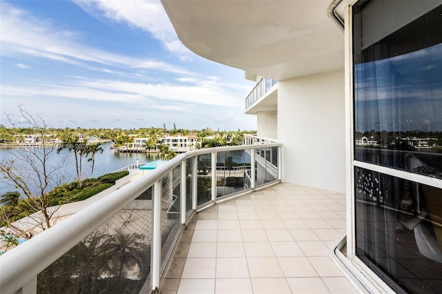 balcony featuring a water view