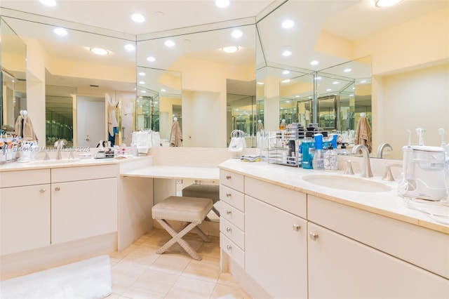 bathroom featuring recessed lighting, vanity, tile patterned floors, and a stall shower