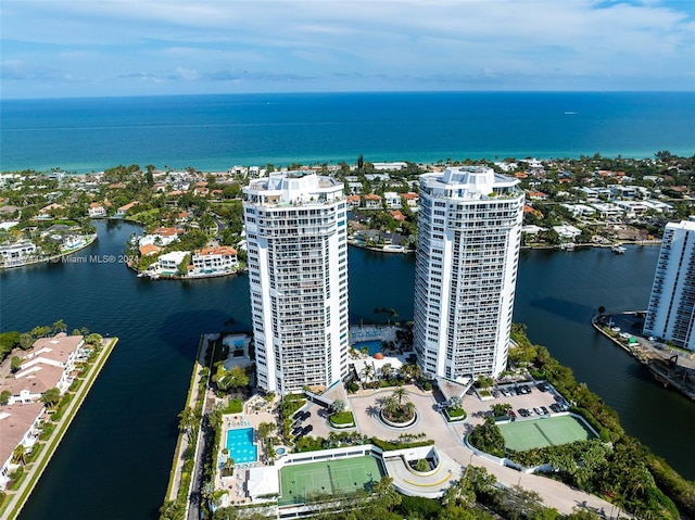 birds eye view of property featuring a water view