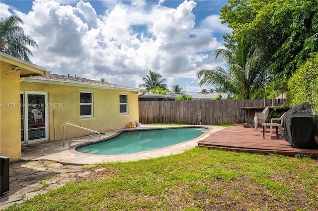 view of pool featuring a wooden deck