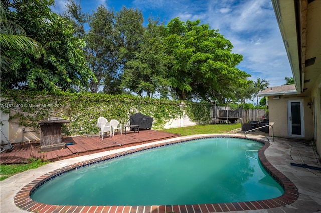 view of pool featuring a deck