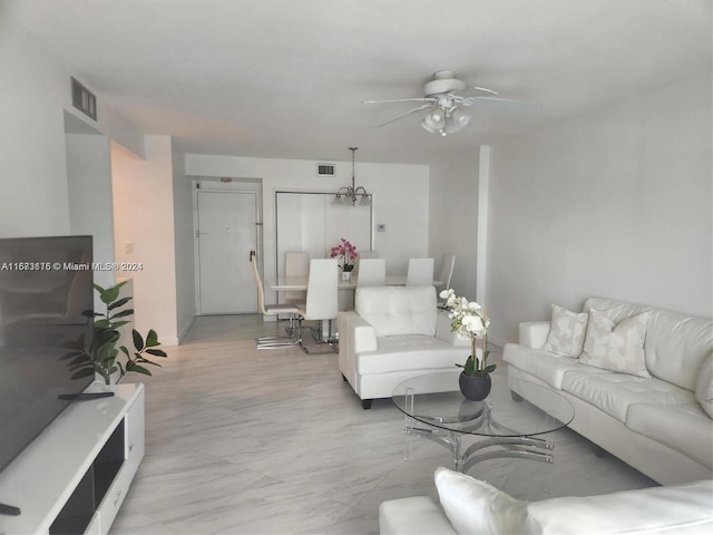 living room featuring ceiling fan