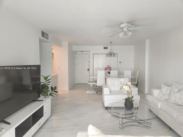 living room featuring ceiling fan