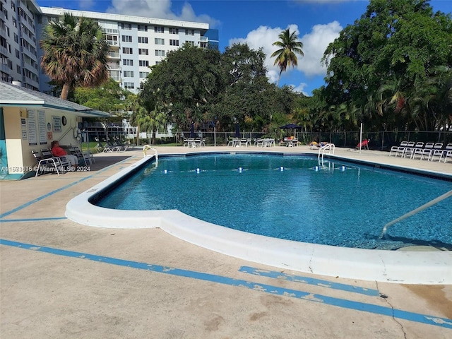 view of pool featuring a patio area