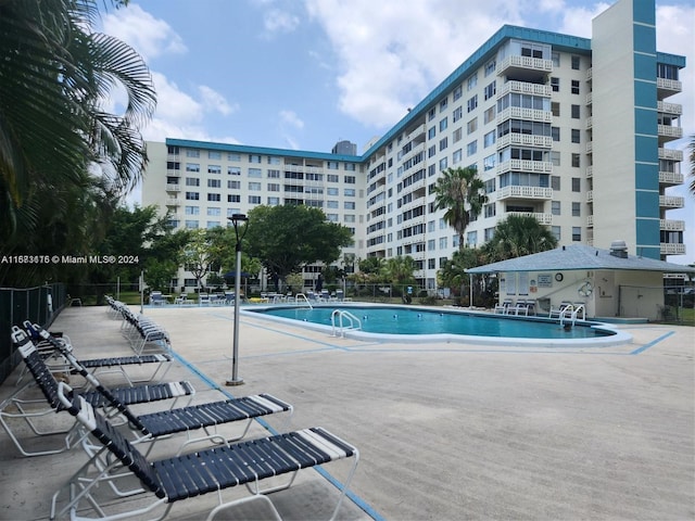 view of pool featuring a patio area