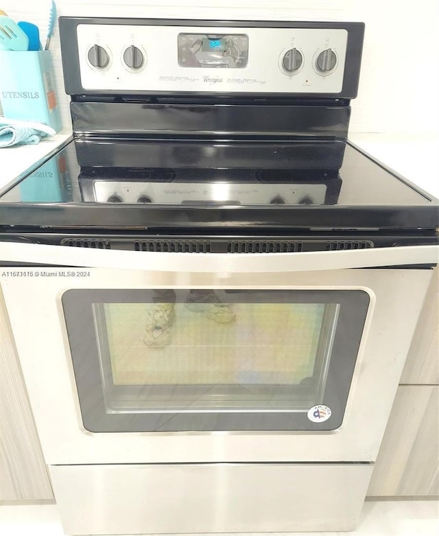 room details featuring stainless steel electric range