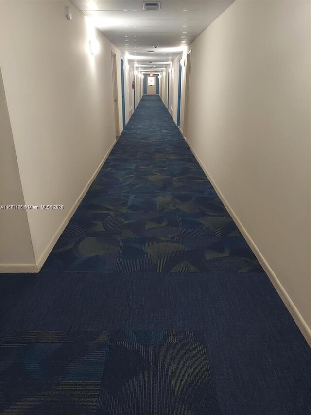 4330 Hillcrest Dr Unit 414, Hollywood, FL 33021 - hall featuring carpet floors and baseboards