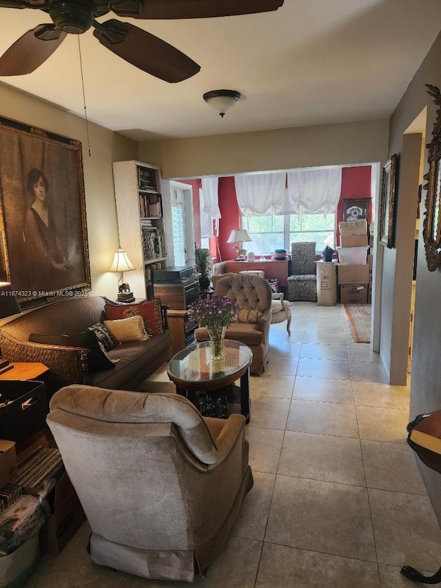 living room featuring tile patterned floors and ceiling fan