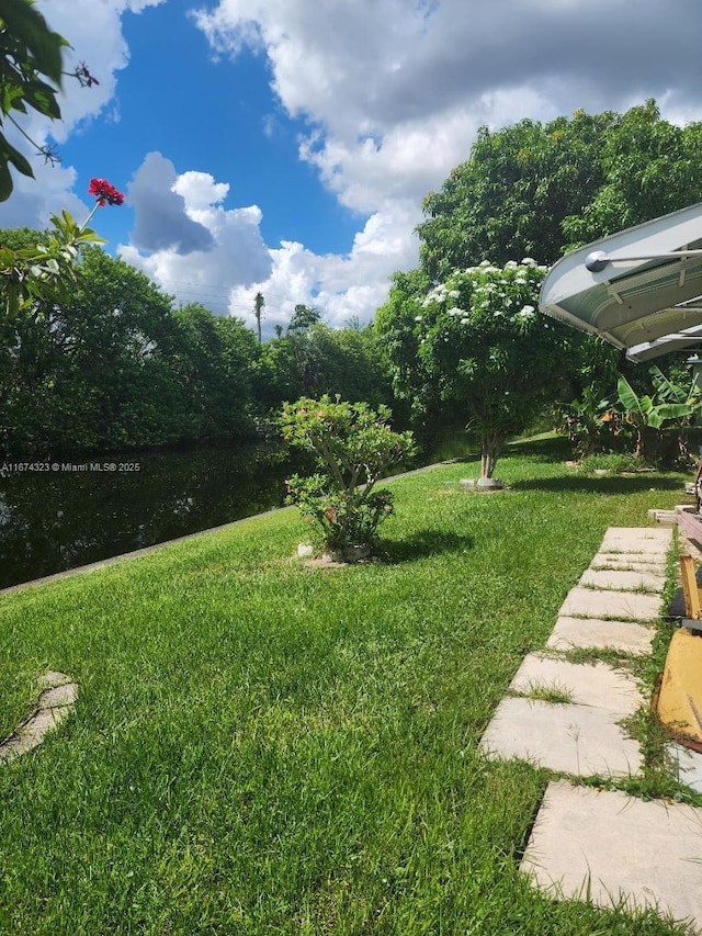 view of yard with a water view
