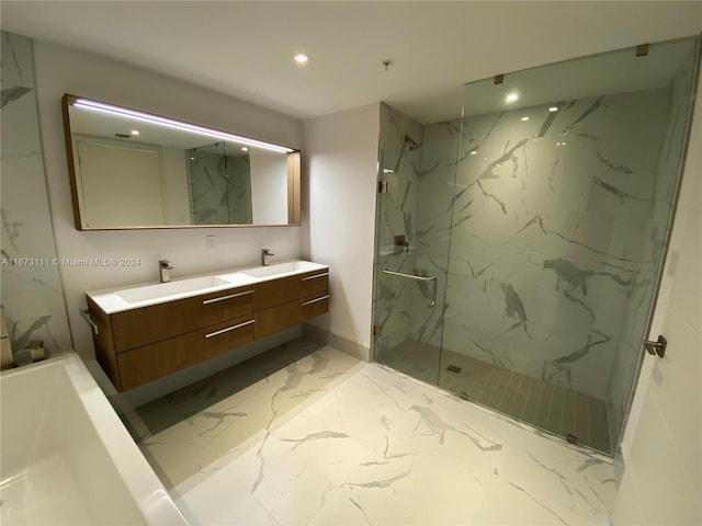 bathroom with vanity and an enclosed shower