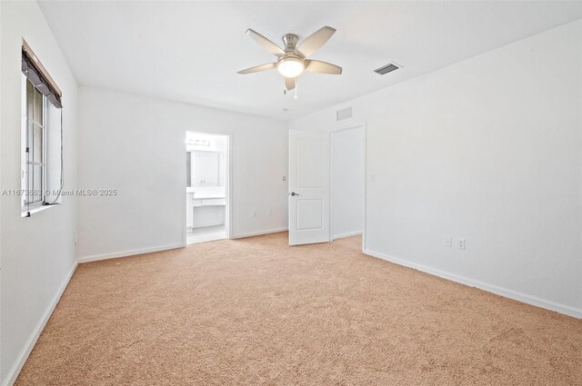 stairway with tile patterned flooring and ceiling fan