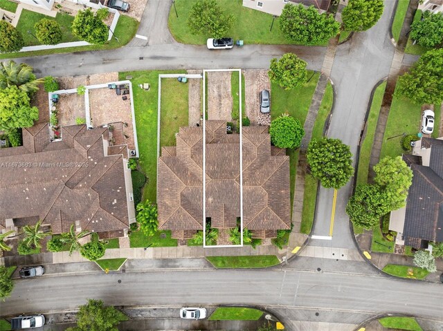 mediterranean / spanish-style home with a front yard