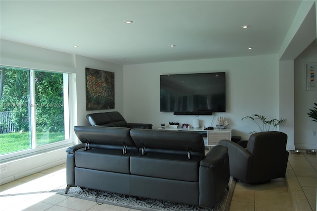 living room with light tile patterned flooring