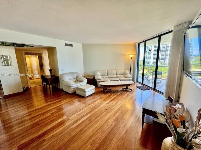 living room with hardwood / wood-style flooring