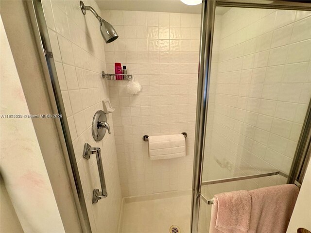 bathroom featuring an enclosed shower