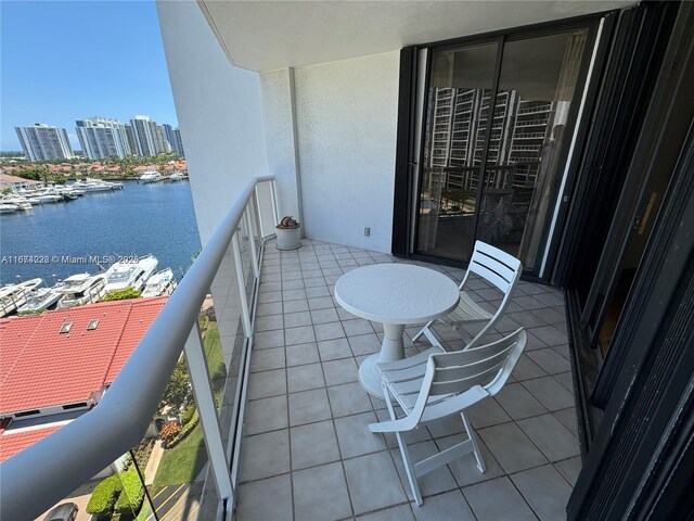 balcony featuring a water view