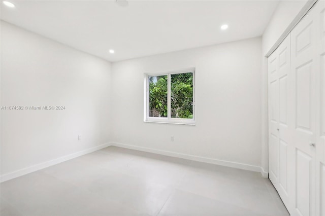 unfurnished bedroom featuring a closet