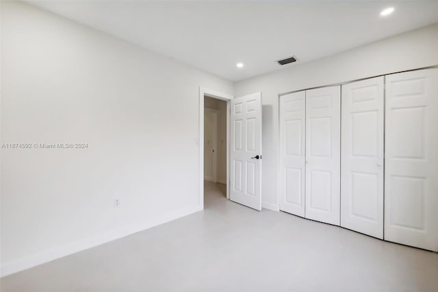 unfurnished bedroom with a closet