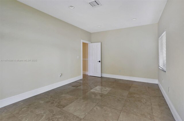 bathroom with tile patterned floors, vanity, toilet, and a shower with shower door