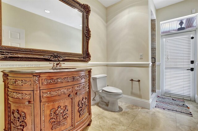 foyer entrance with ornamental molding, a towering ceiling, a wealth of natural light, and french doors