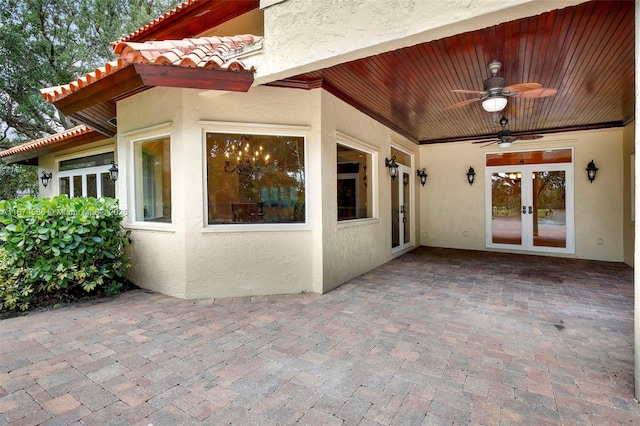 view of patio / terrace with ceiling fan and french doors