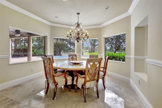 dining space featuring plenty of natural light, ceiling fan with notable chandelier, and crown molding