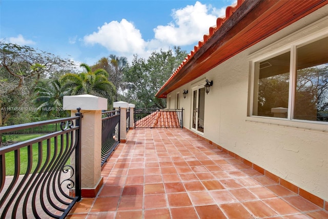 view of patio / terrace with a balcony