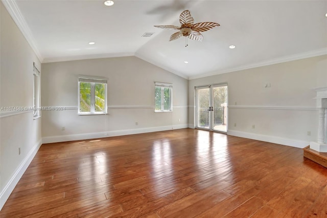 spare room with crown molding, vaulted ceiling, hardwood / wood-style flooring, and ceiling fan