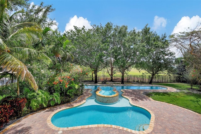 view of pool with a fenced in pool, a fenced backyard, and a yard