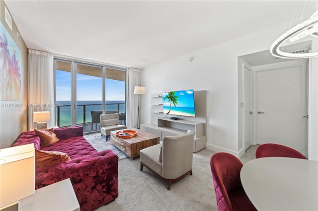 living room with light carpet and expansive windows