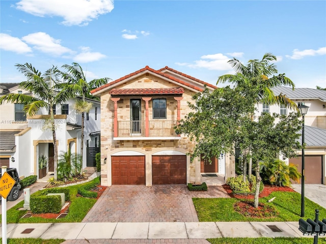 view of front of property with a garage