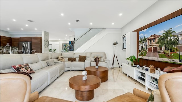 living room featuring sink