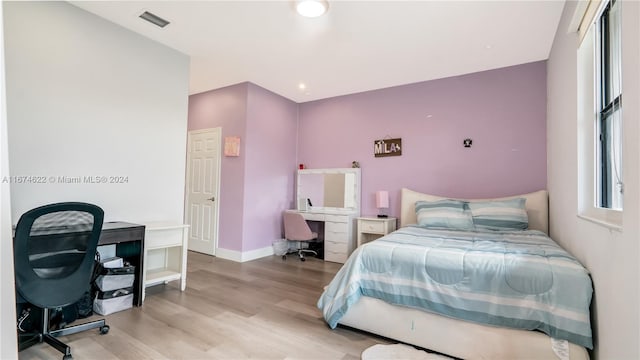 bedroom featuring light hardwood / wood-style flooring