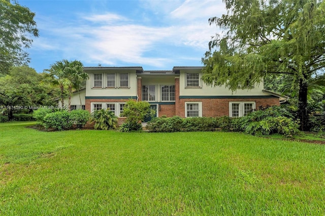 bi-level home with a front yard