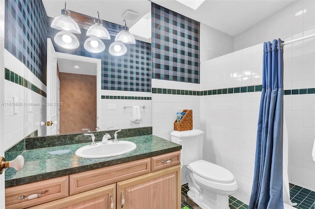 bathroom featuring walk in shower, vanity, tile walls, tile patterned flooring, and toilet